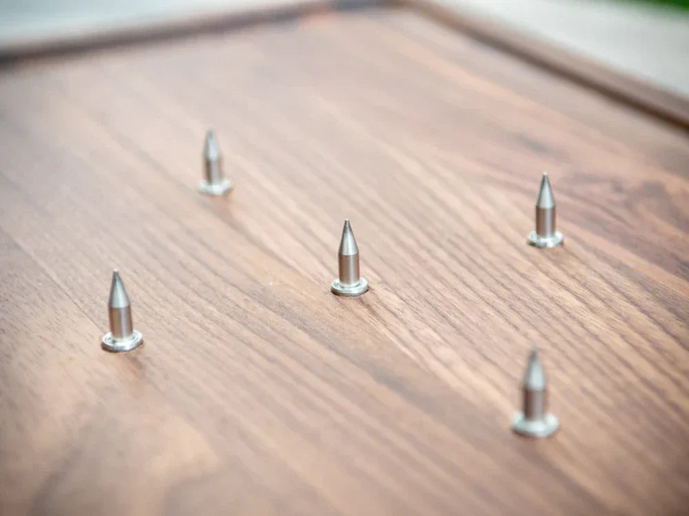 A spiked hardwood board made by The Chopping Block Shop