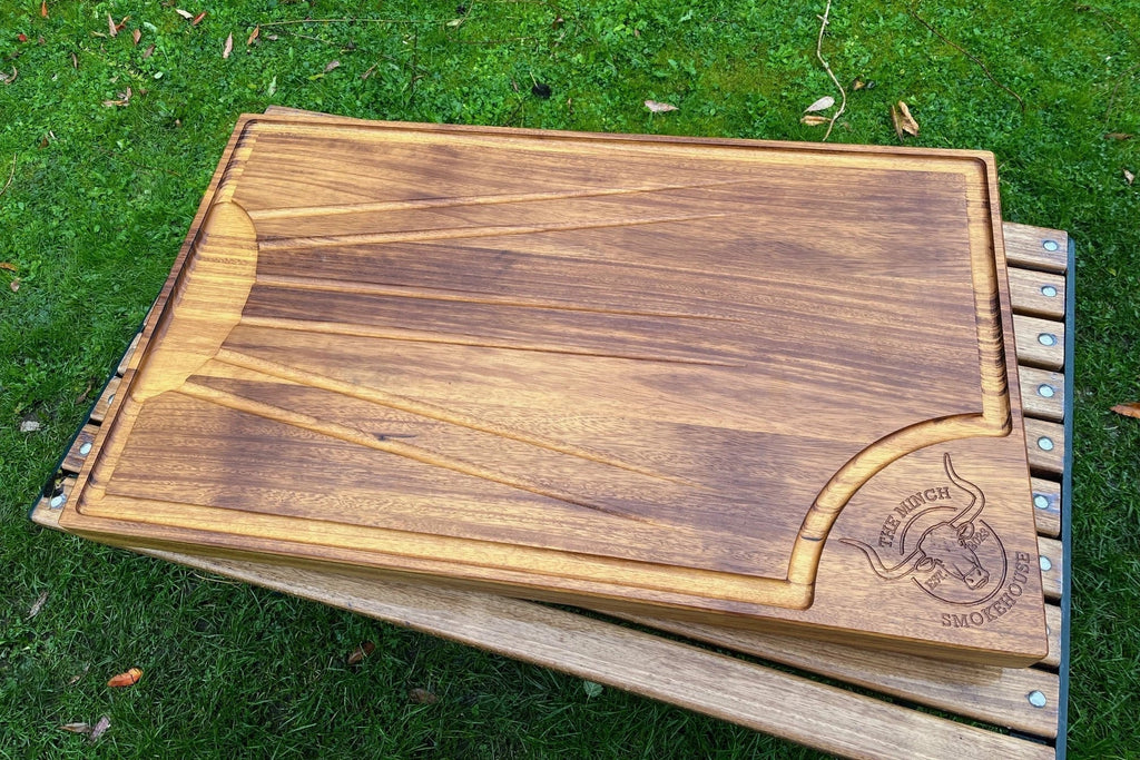A hardwood board with logo engraving