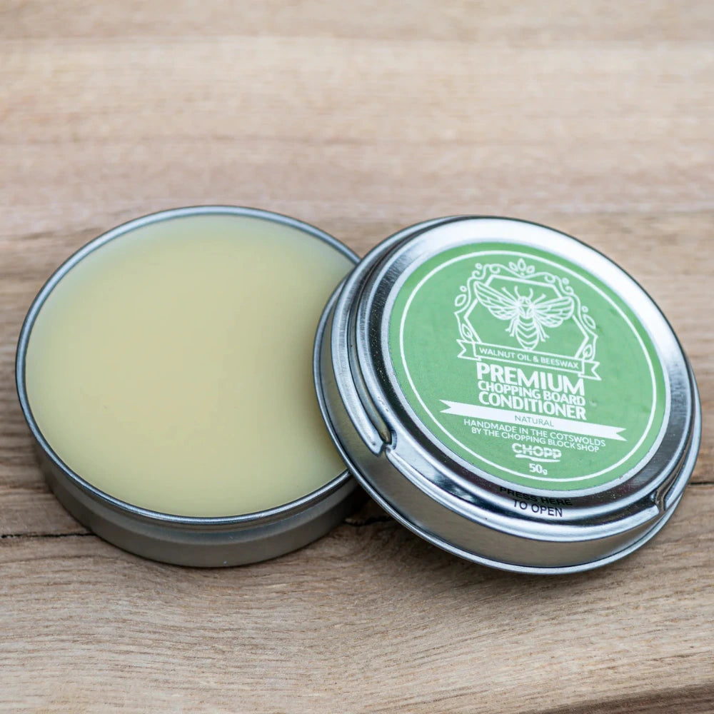 chopping board conditioner in a small tin