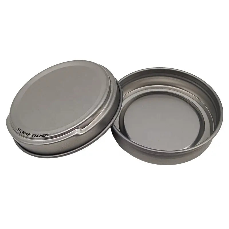 Silver Round Seamless 'Push To Open' Shoe Polish Style Tin with a 50ml/50g capacity.  Available in a box of 250, multiples thereof, or in smaller quantities as required.  Supplied by The Chopping Block Shop