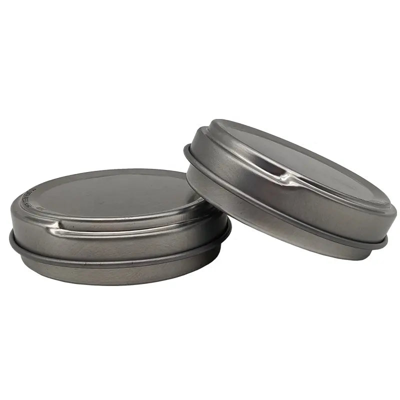 Silver Round Seamless 'Push To Open' Shoe Polish Style Tin with a 50ml/50g capacity.  Available in a box of 250, multiples thereof, or in smaller quantities as required.  Supplied by The Chopping Block Shop