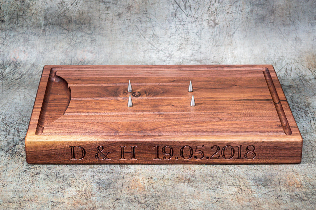 D&H text and dated engraving on a chopping board